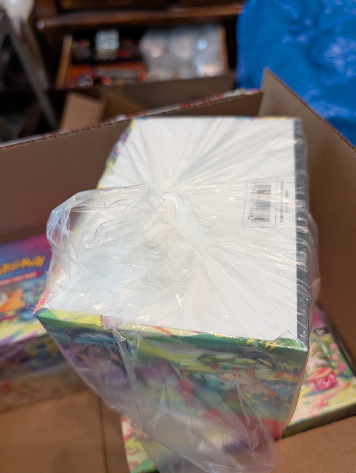 Pokemon TCG: Scarlet and Violet Prismatic Evolutions Mini Tin Display